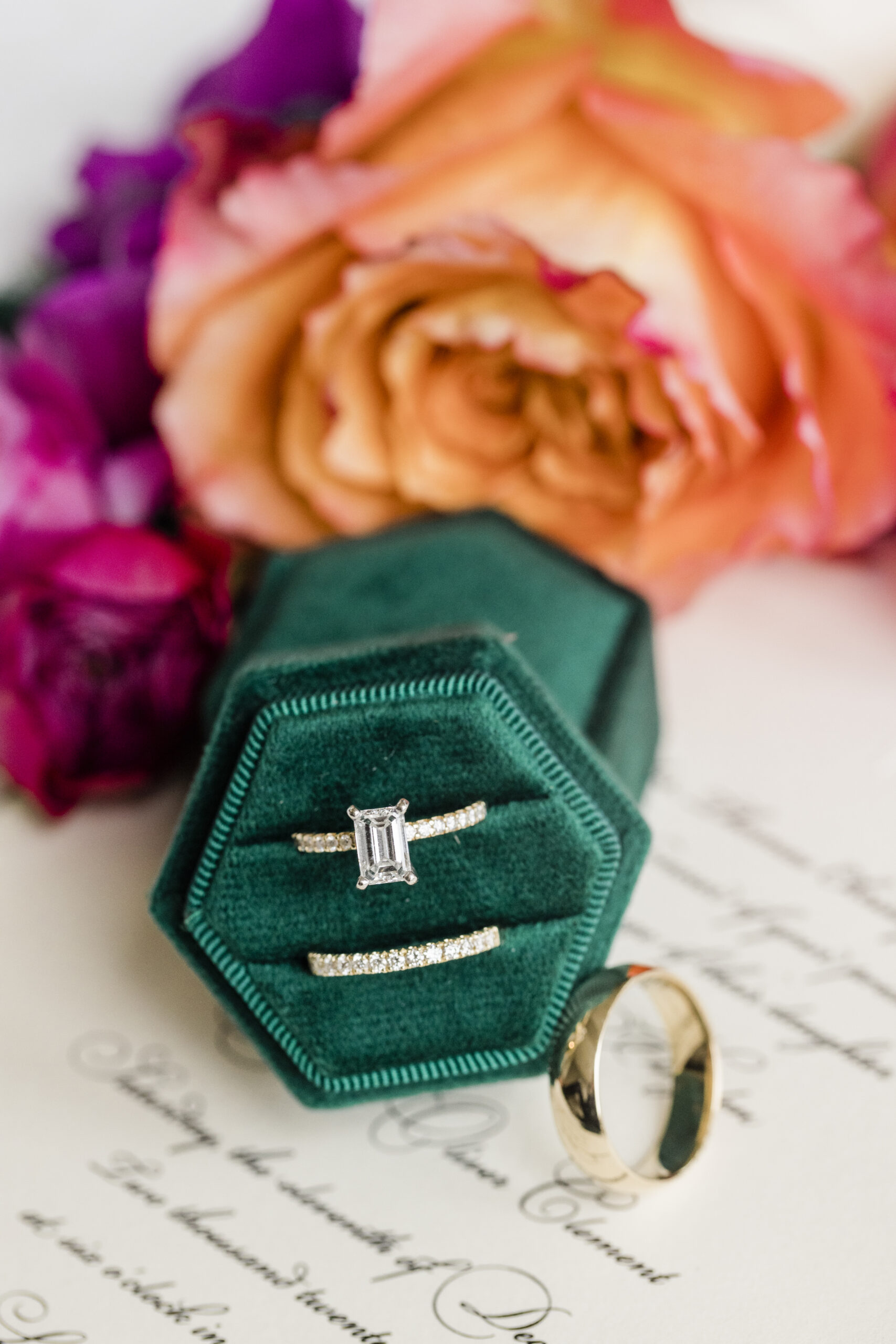 The rings from Levy's Fine Jewelry are places in a green velvet ring box.