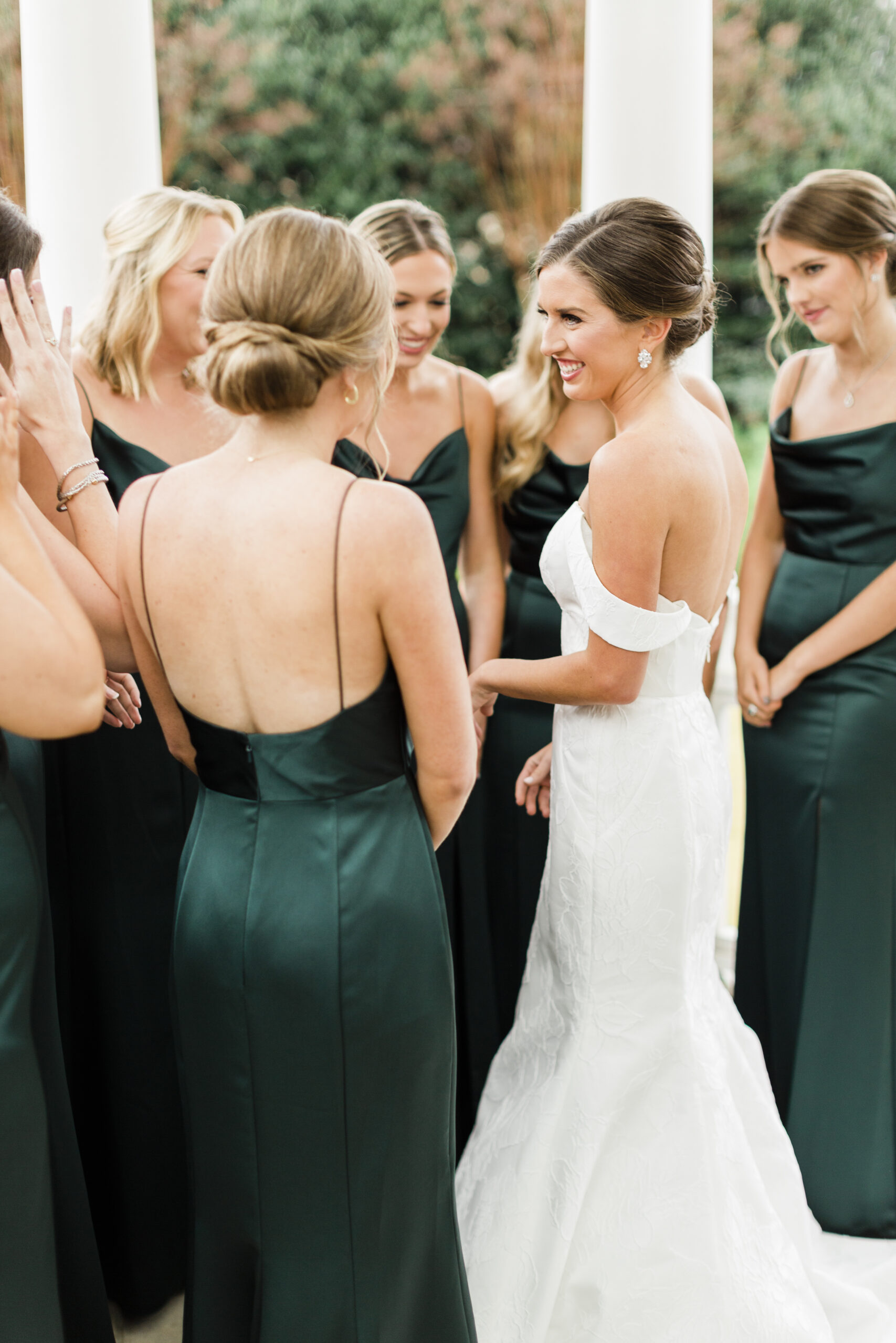 The bridesmaids see the bride for the first time.