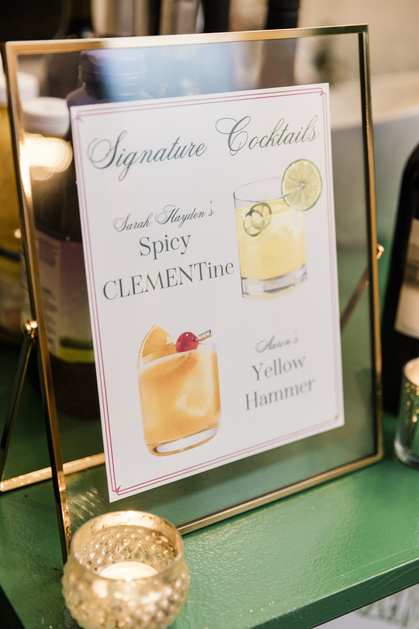 The signature cocktails for the wedding reception are a Spicy Clementine and a Yellow Hammer.