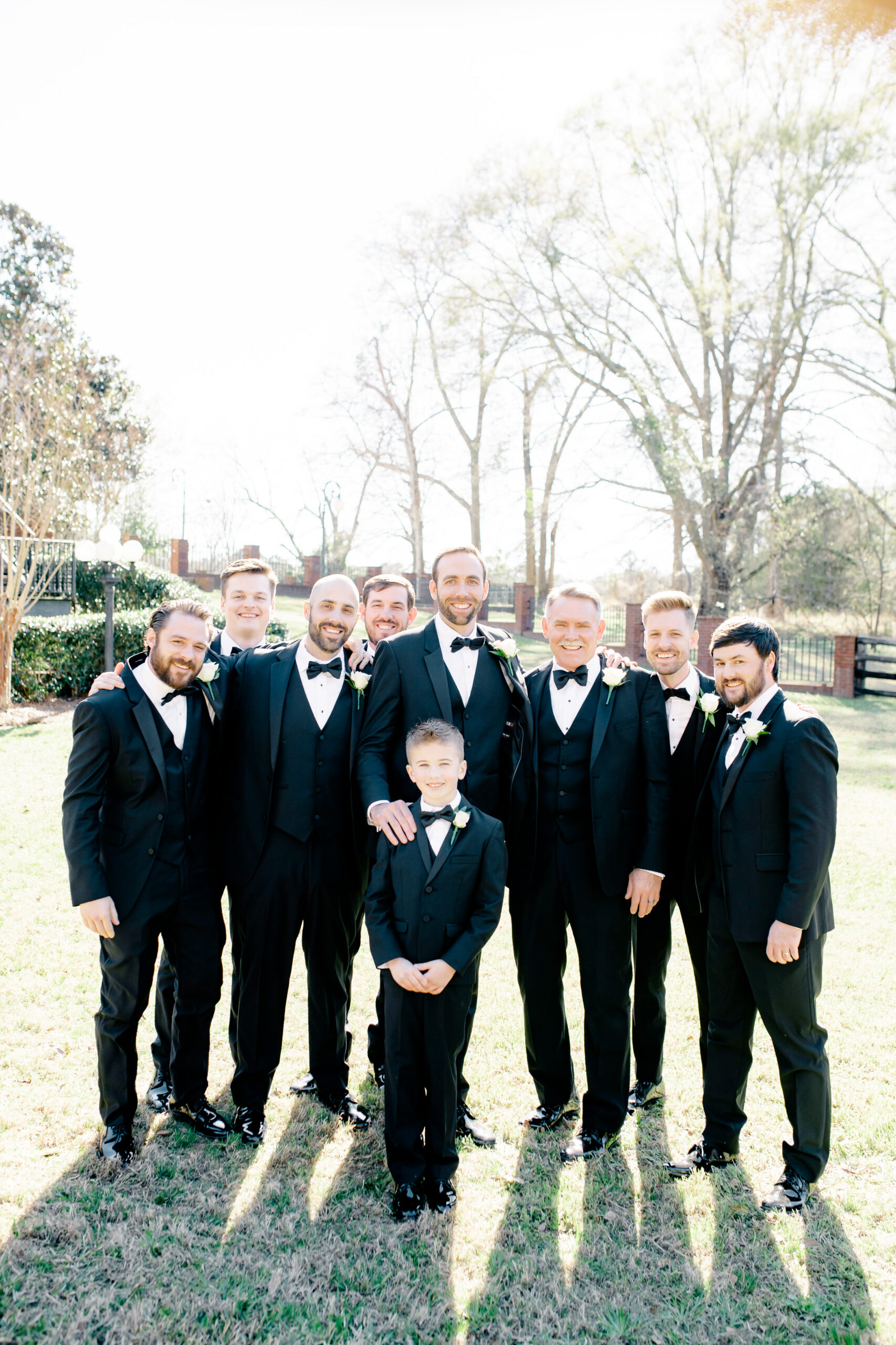 The groomsmen stand with the groom at Marsgate.