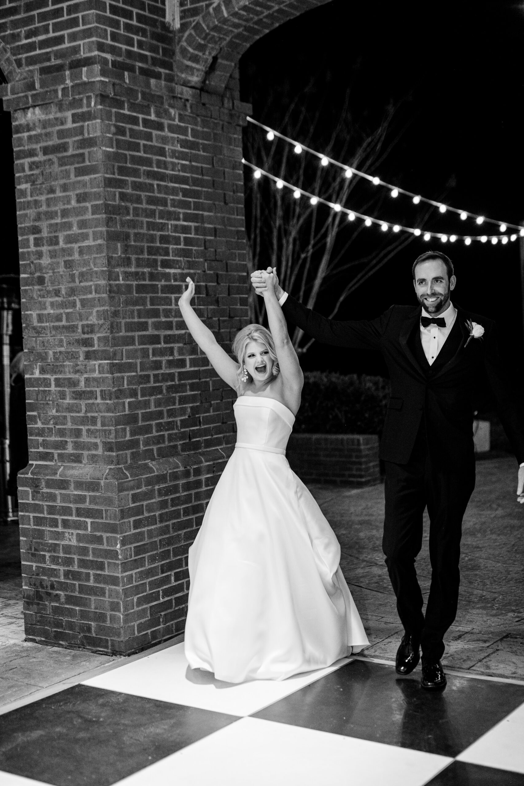 The bride and groom enter their wedding reception at Marsgate in Alabama.