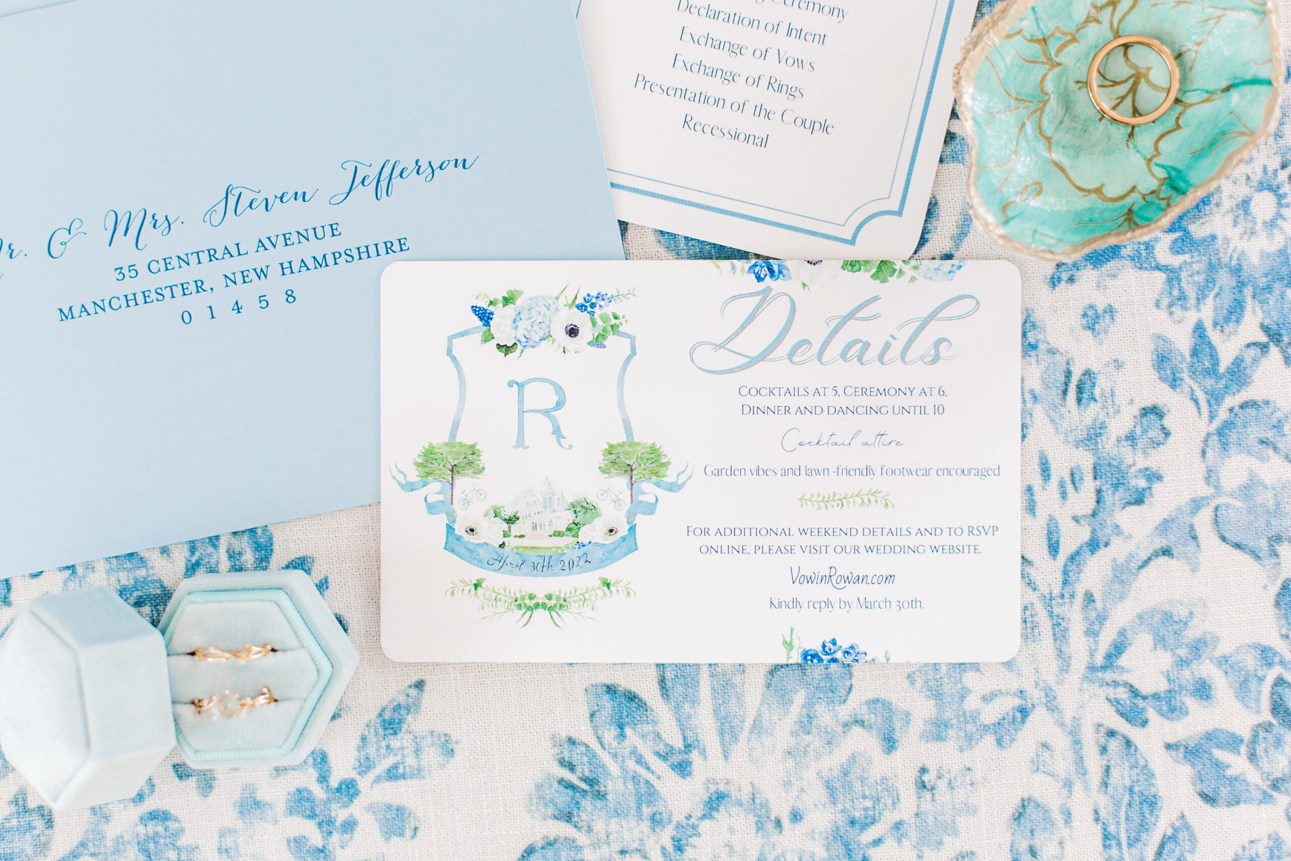 The stationery is photographed in a lay flat style for the Southern wedding.