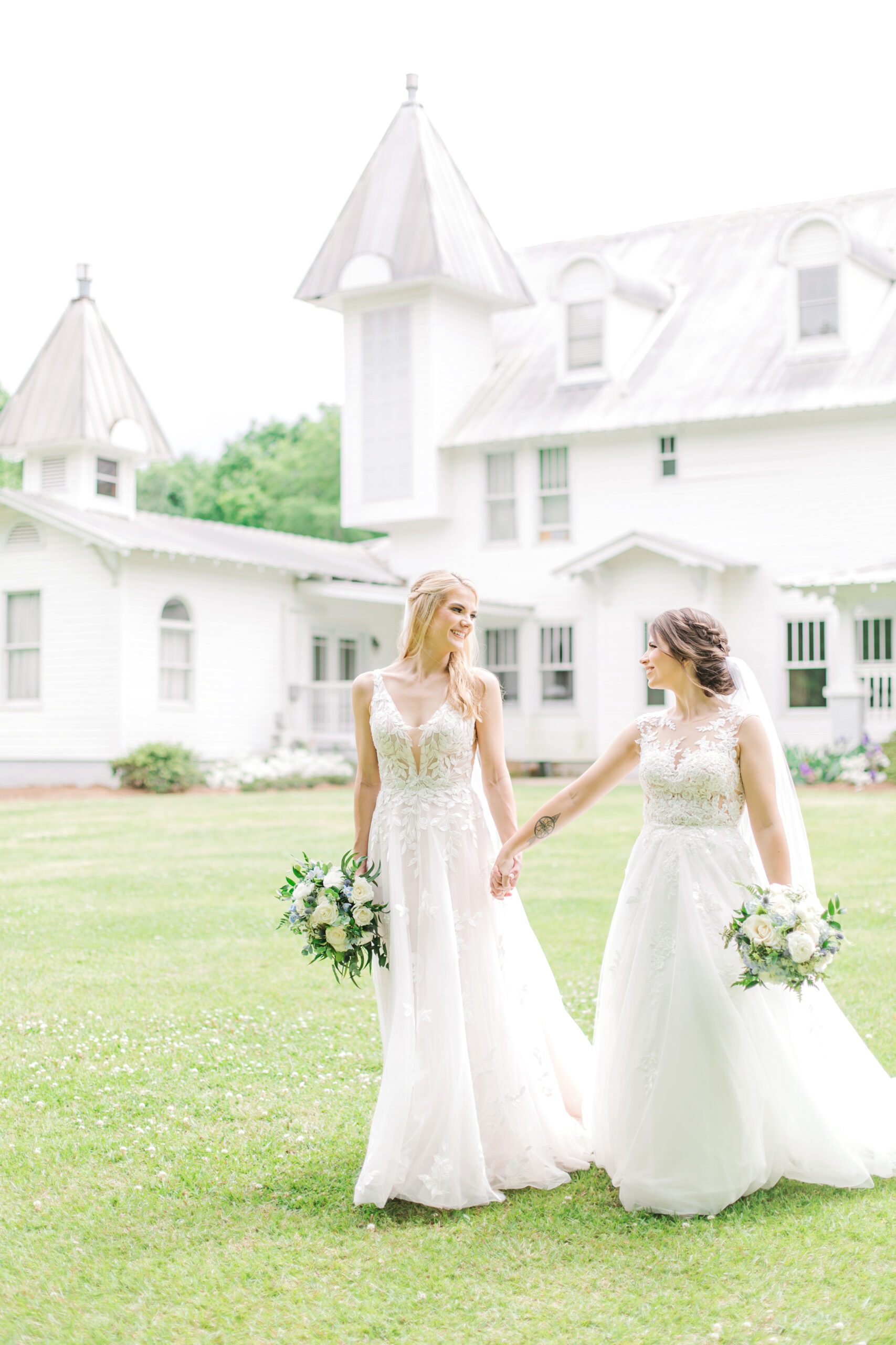 The brides walk together outside The Sonnet House.