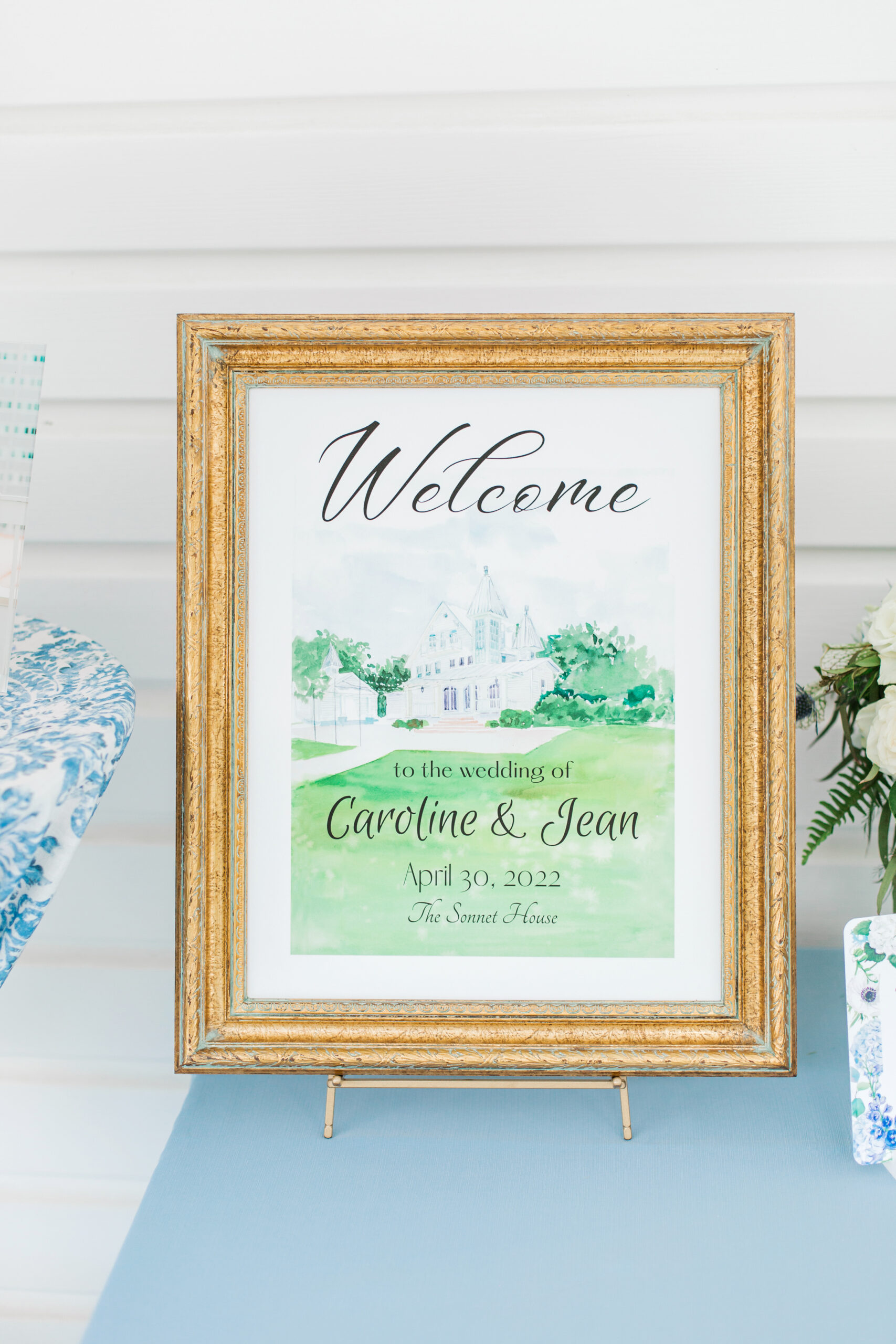 The welcome sign is a watercolor artwork of The Sonnet House.