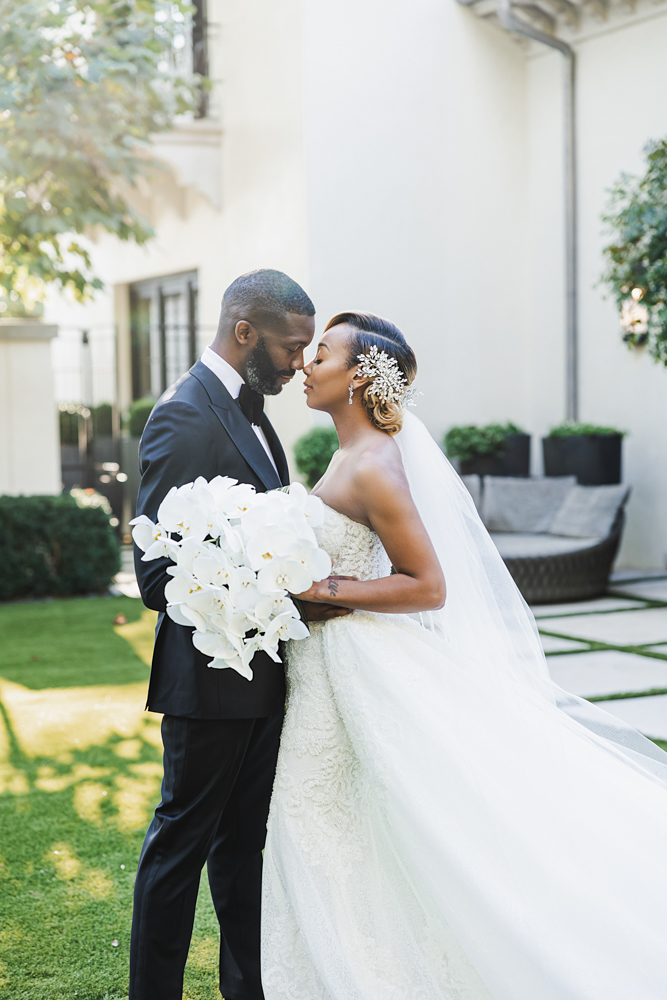 The couple embraces before the Birmingham, Alabama wedding ceremony.