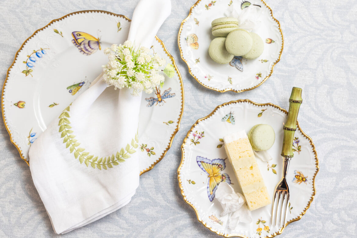 Wedding cake and macarons on a fine china for an Alabama wedding.