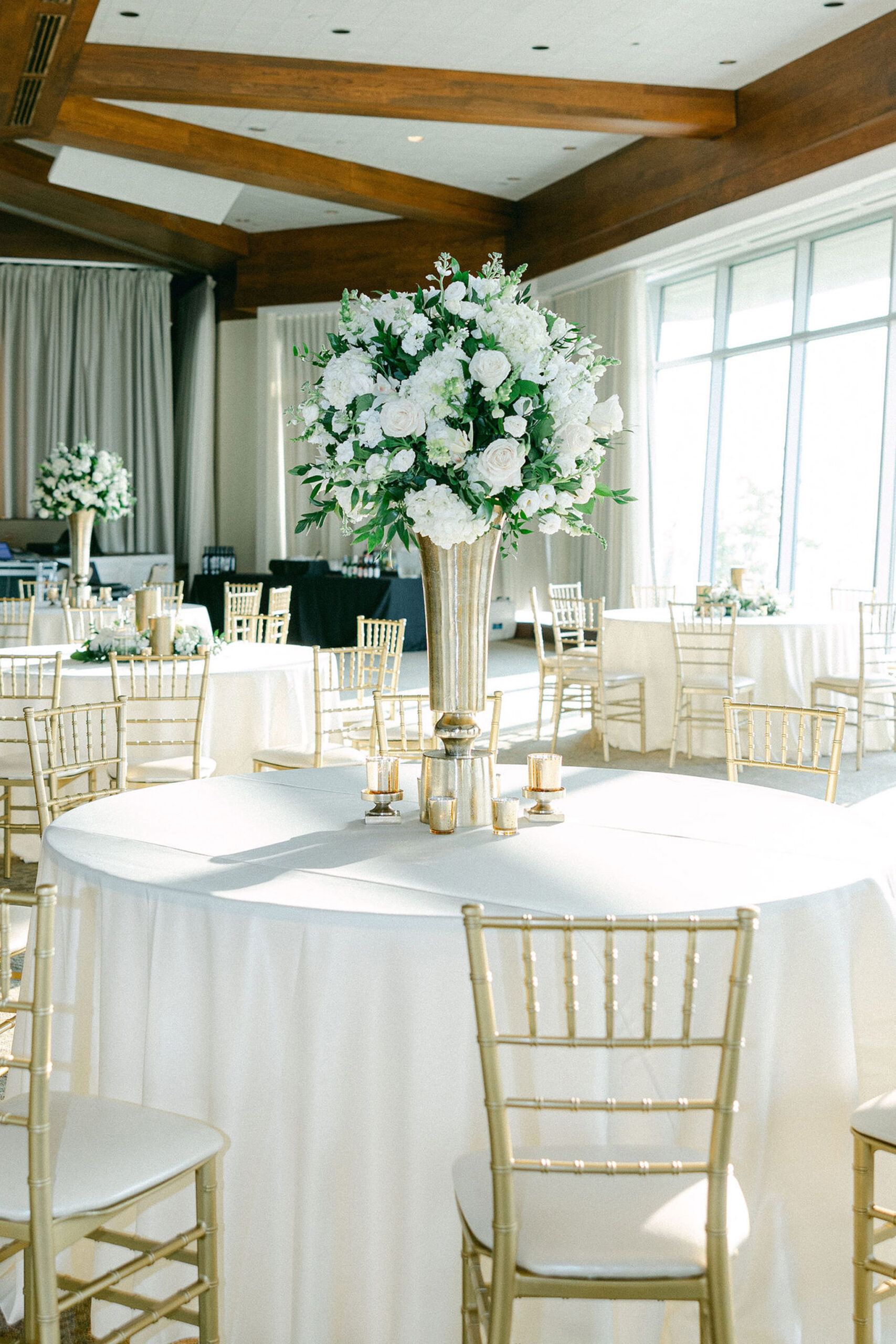 A classic white floral centerpiece is placed on the table at The Club in Birmingham.