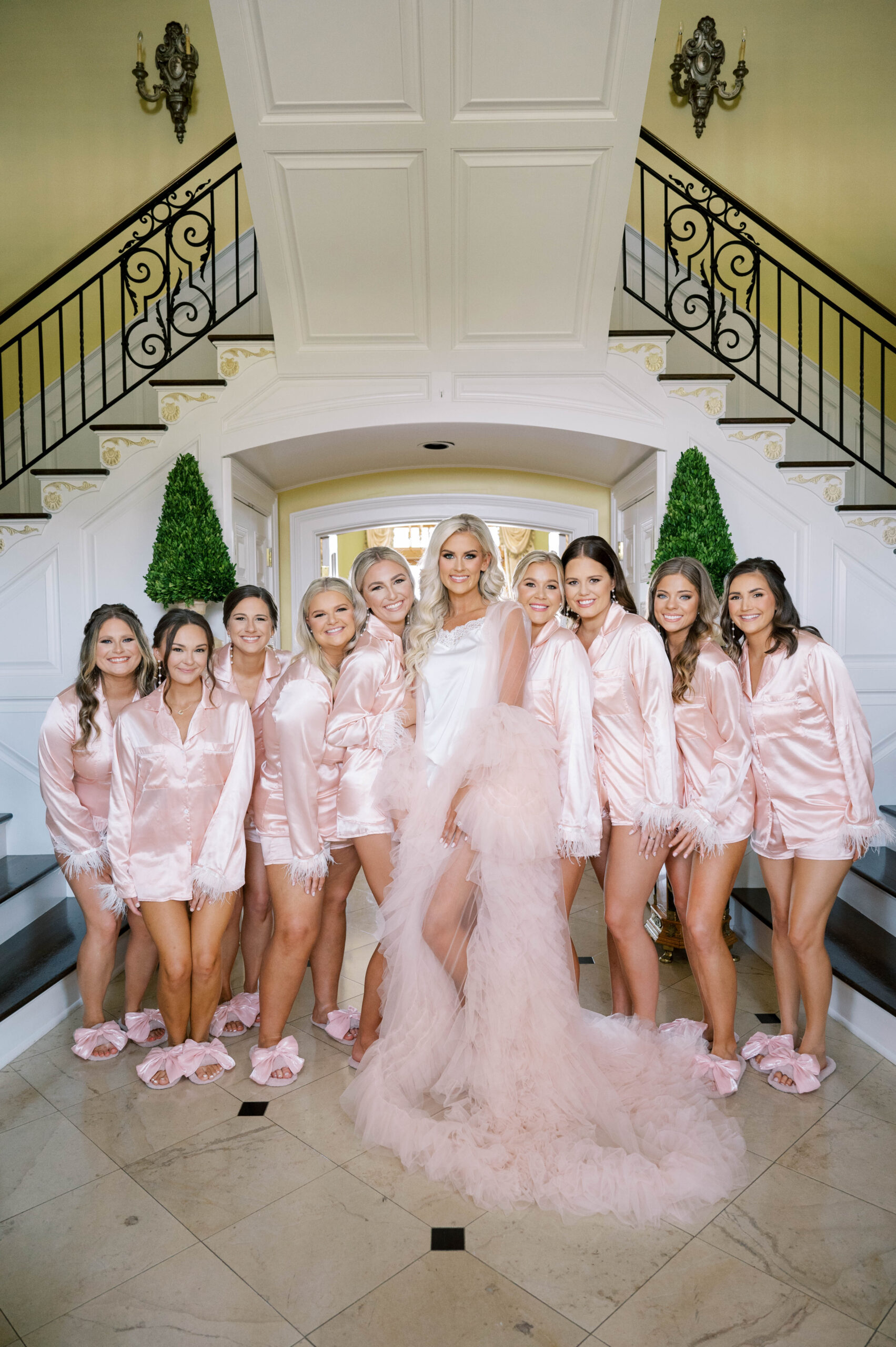 The bridal party poses together on the morning of the wedding.