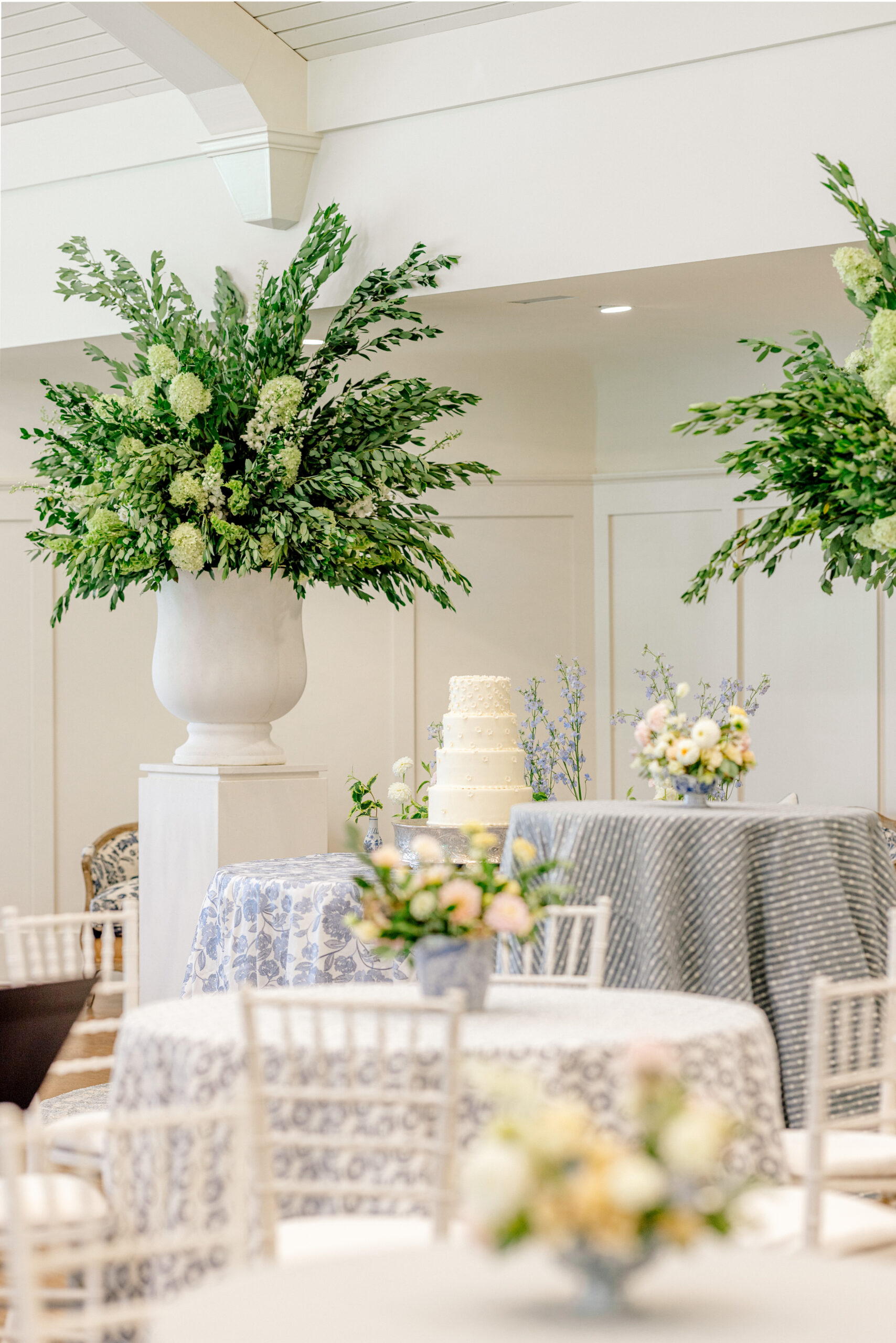 The wedding at Pursell Farms is white and blue.