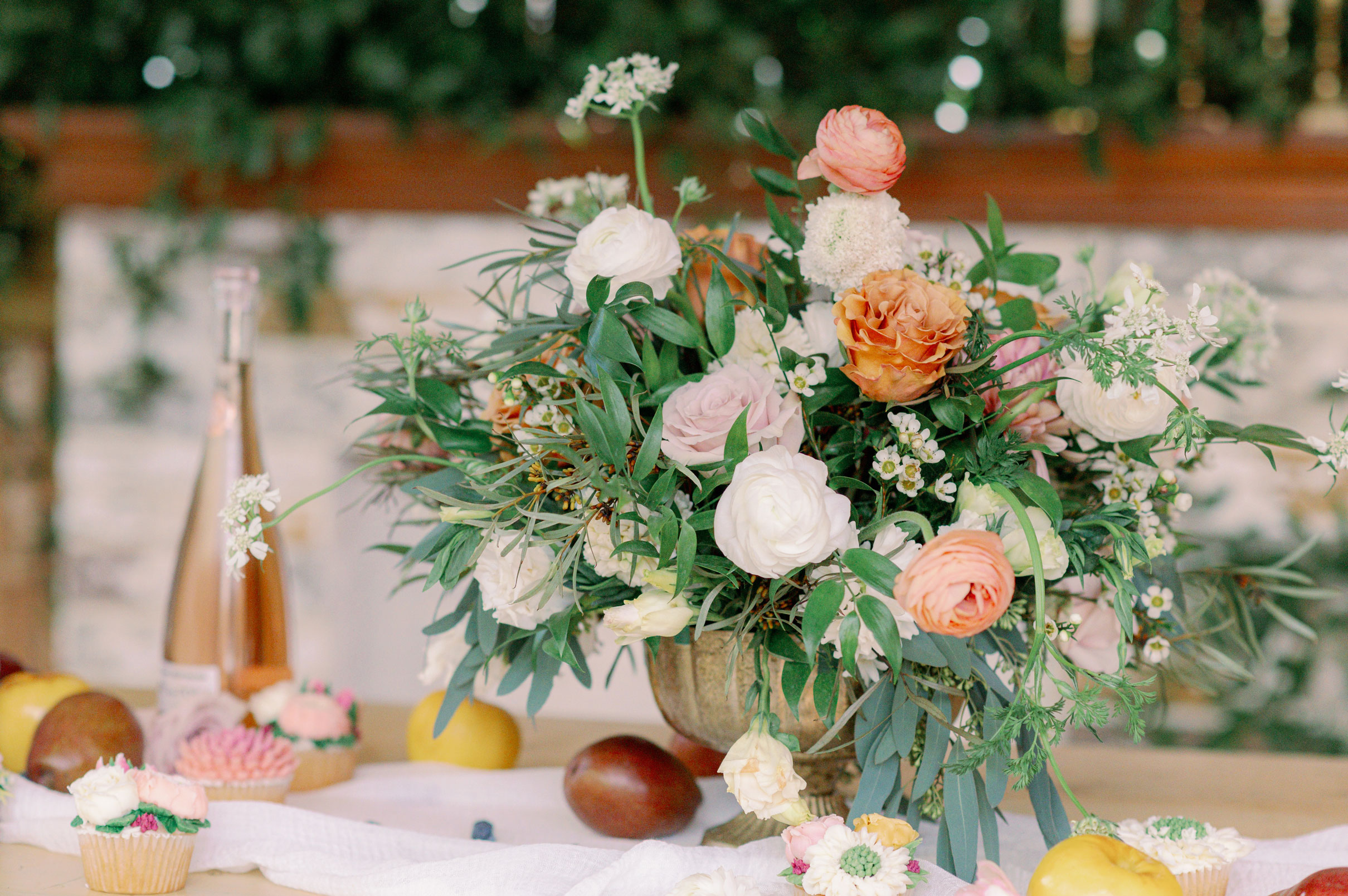 A flower arrangement is placed on the table for a wedding at Ivy Oaks in Alabama.