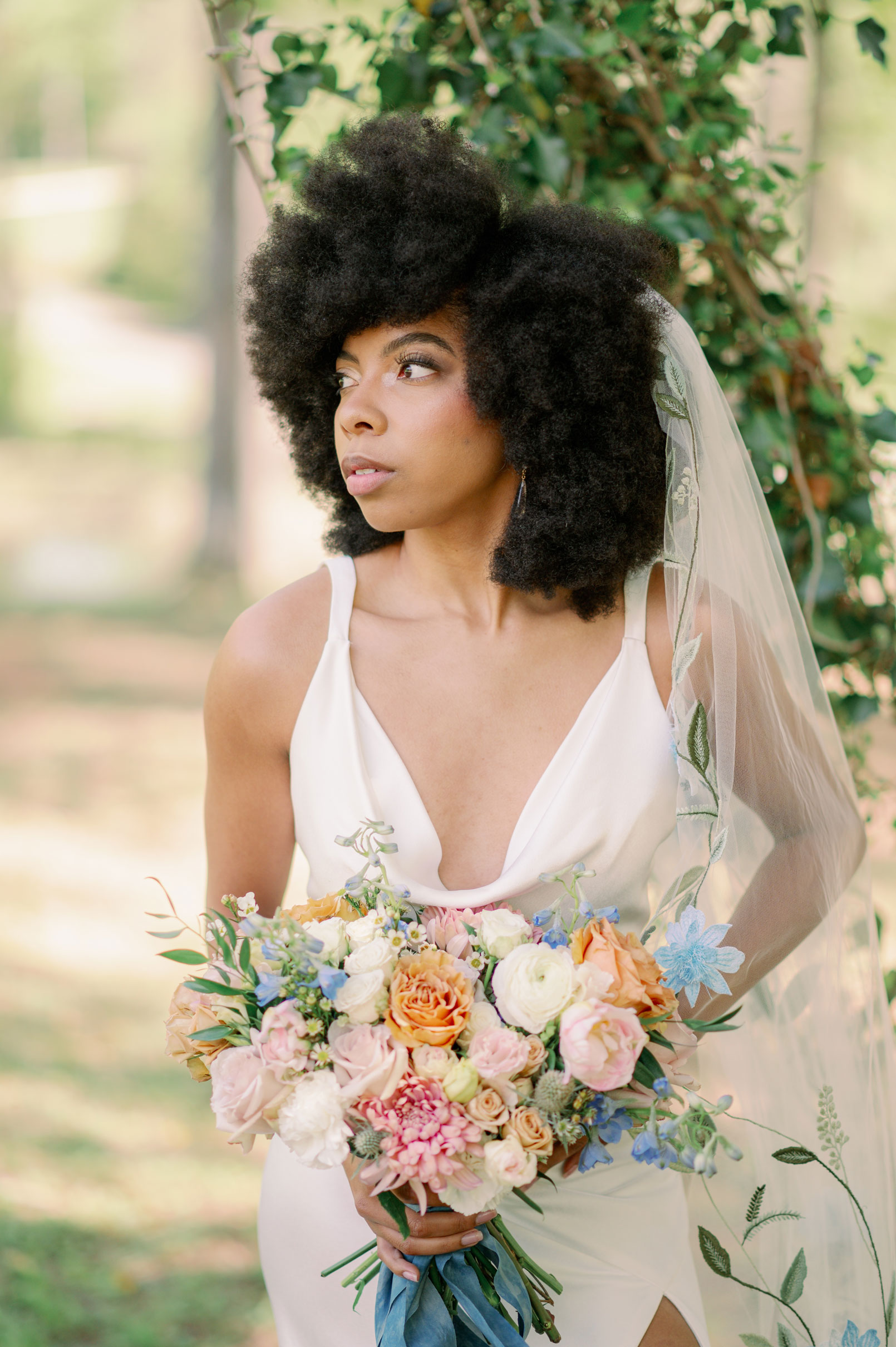 The bride holds her bouquet for her spring wedding in Alabama.