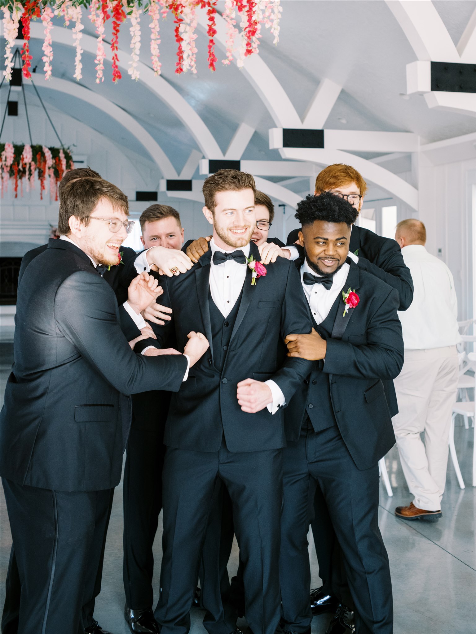 The groomsmen stand together before the wedding in Alabama.