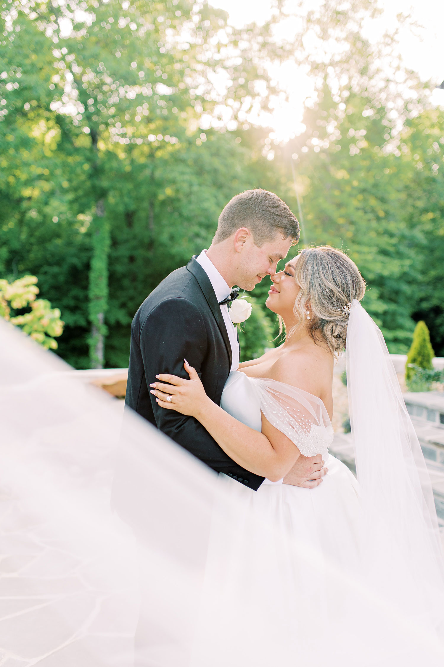 The bride and groom embrace before the wedding ceremony in Florence, Alabama.