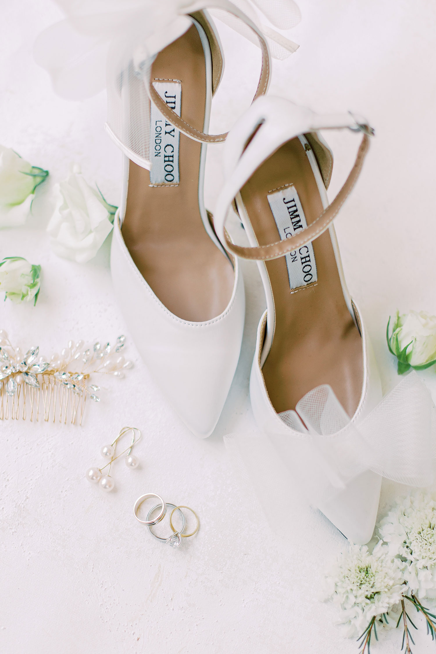 The Jimmy Choo shoes for the bride are styled with her jewelry for this Alabama wedding day.