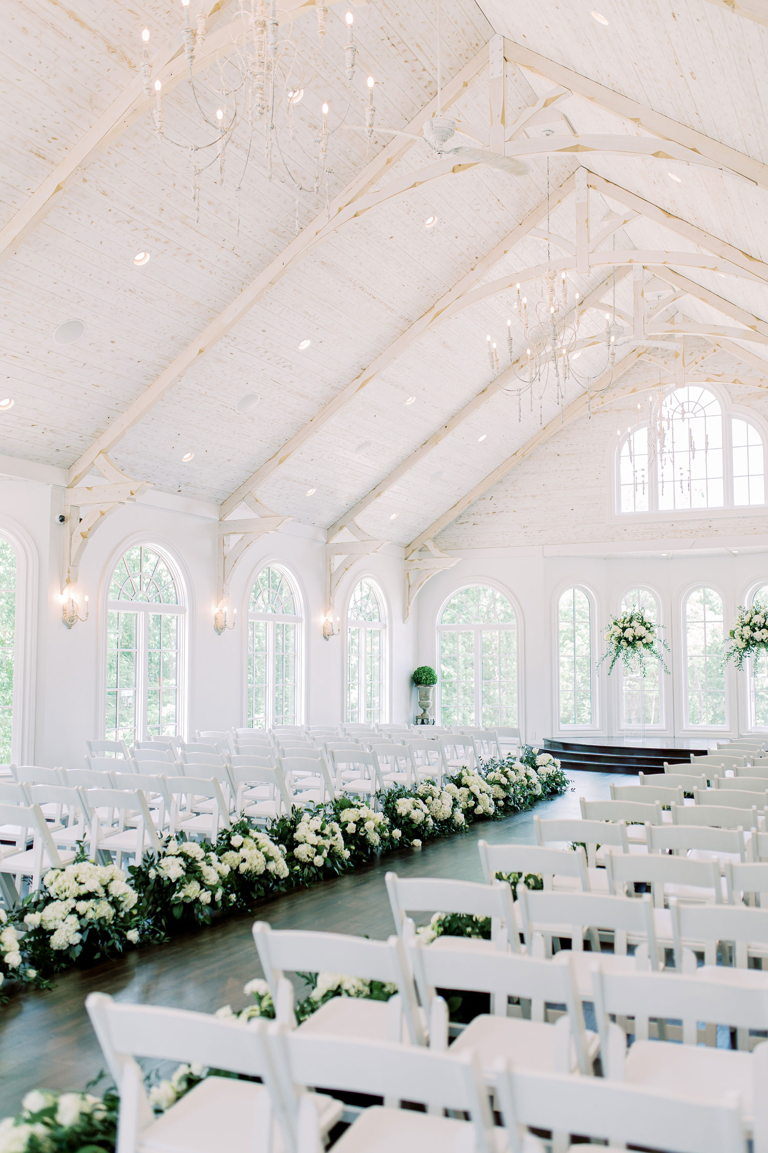 The wedding chapel in Florence, Alabama is decorated with white flowers.