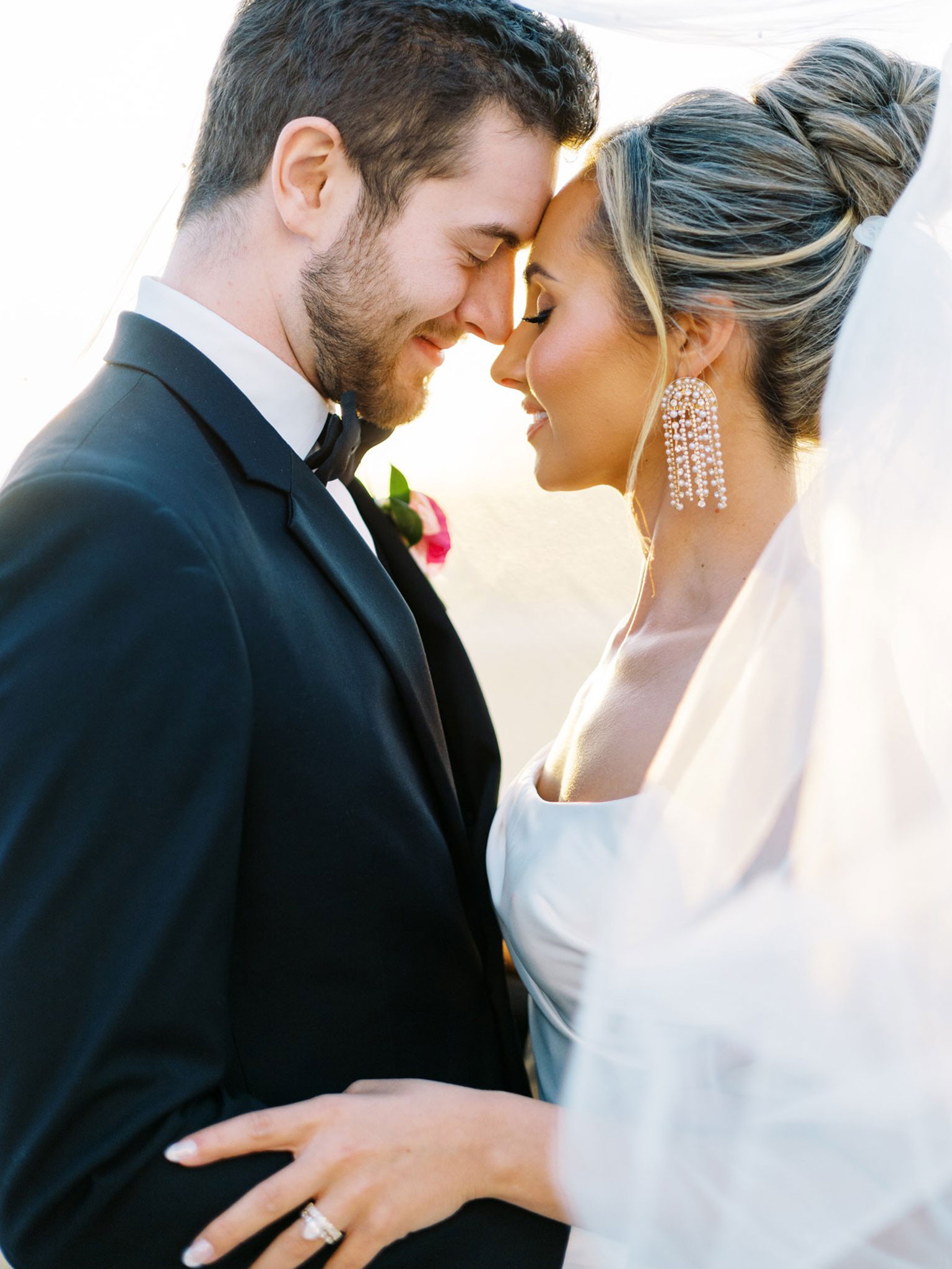 A bride and groom embrace in Alabama.